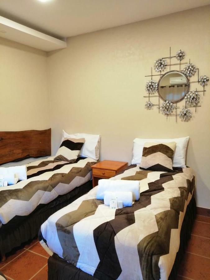 Ambay Suites & Dorms Пуерто-Іґуасу Екстер'єр фото