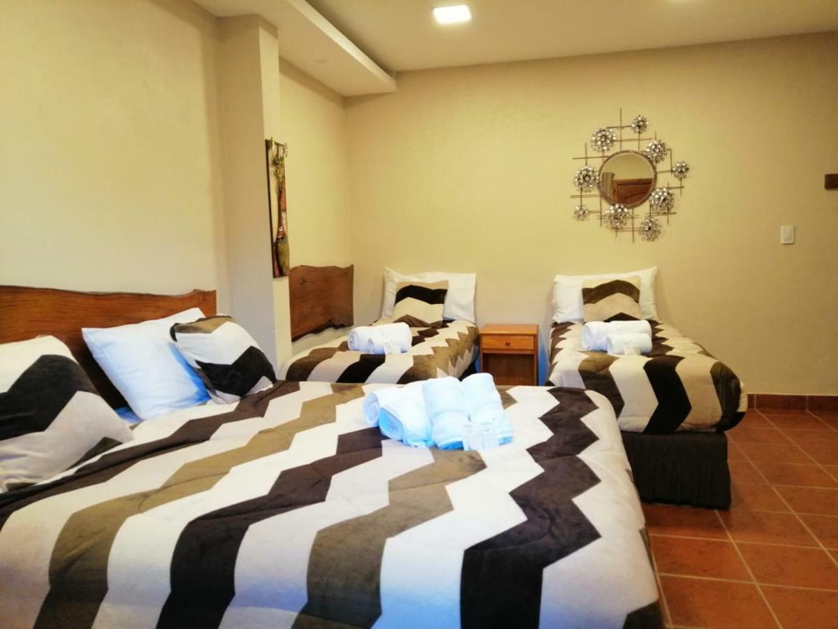 Ambay Suites & Dorms Пуерто-Іґуасу Екстер'єр фото